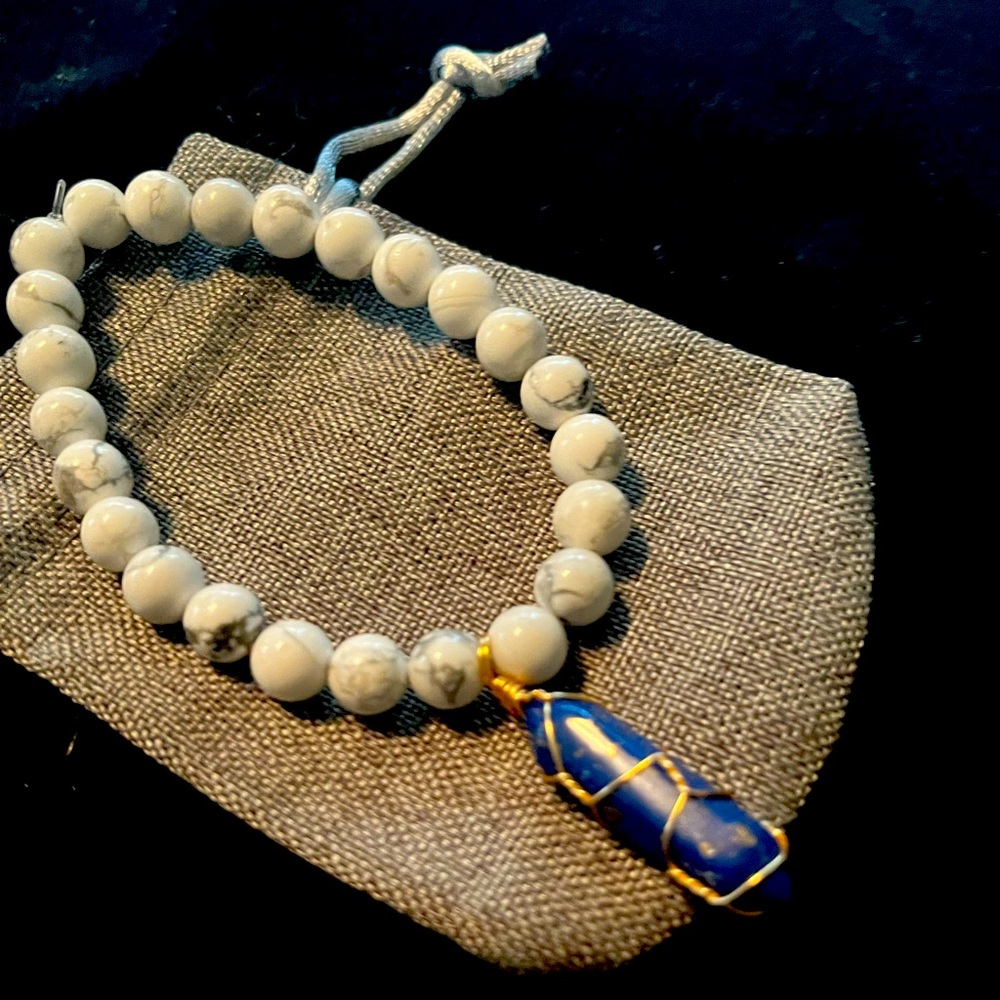 Hand beaded moonstone bracelet with lapis lazuli pyramid charm
